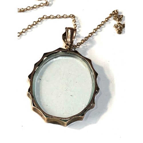 186 - 9ct gold picture locket necklace  locket measures approx 3.6cm drop by 2.3cm weight 5.5g chian broke... 