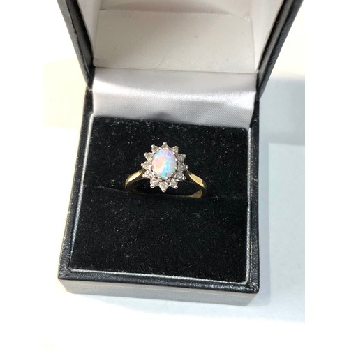 103 - 18ct Antique opal diamond halo ring 3.7g