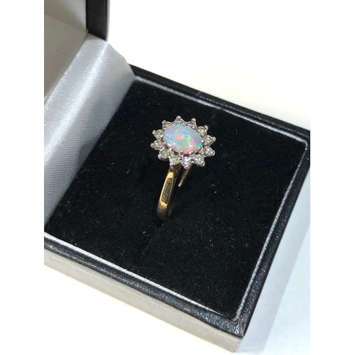 103 - 18ct Antique opal diamond halo ring 3.7g