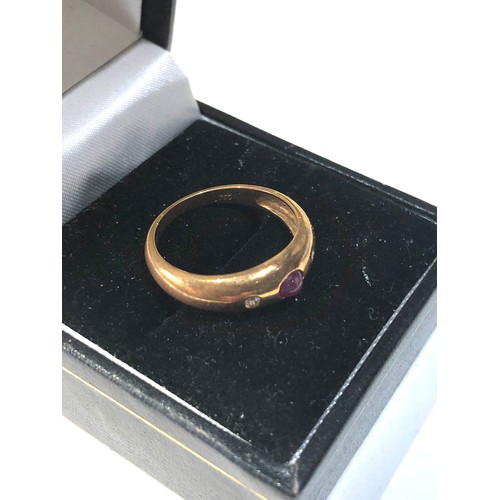 290 - 18ct gold ruby and diamond band ring stamped 750 weight 2.8g