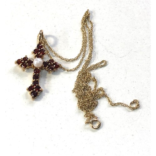 250 - Small 9ct gold garnet crucifix pendant and chain weight 2.3g