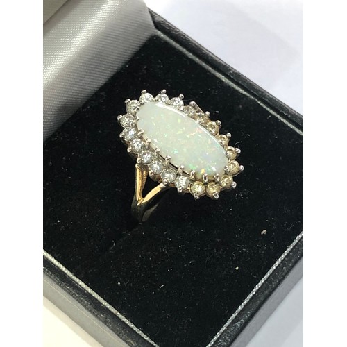 118 - 9ct gold opal halo ring weight 3.2g