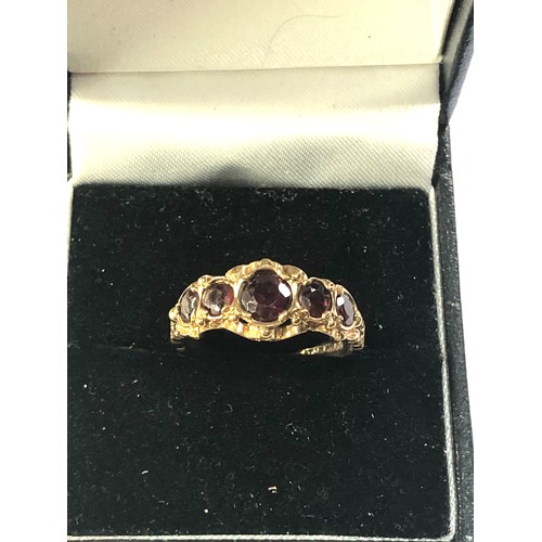 297 - 9ct gold garnet 5 stone ring weight 3.1g