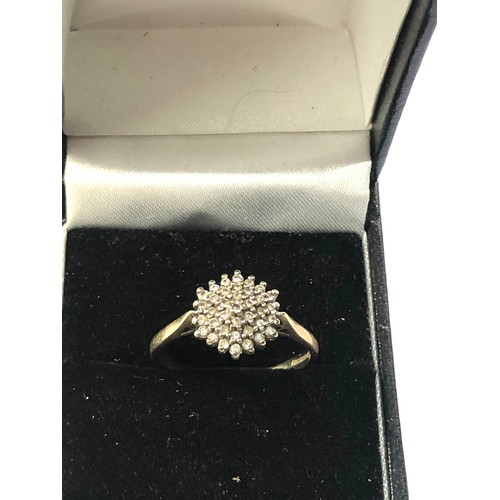 96 - 9ct gold diamond cluster ring weight 3.2g