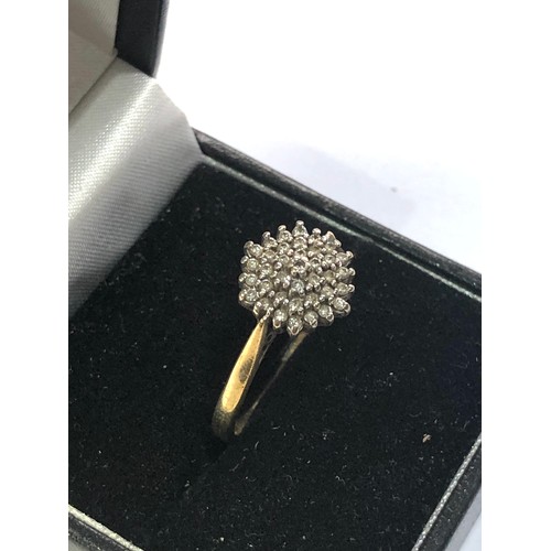 96 - 9ct gold diamond cluster ring weight 3.2g