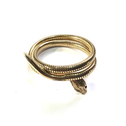 263 - 9ct gold snake bracelet weight 30g full 9ct gold hallmarks steel spring