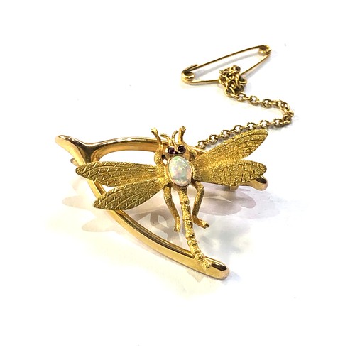 160 - 15ct gold dragonfly & wishbone opal ruby brooch measures approx 3.2cm by 2.3cm weight 4.5g