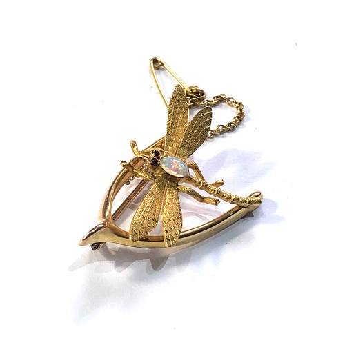 160 - 15ct gold dragonfly & wishbone opal ruby brooch measures approx 3.2cm by 2.3cm weight 4.5g