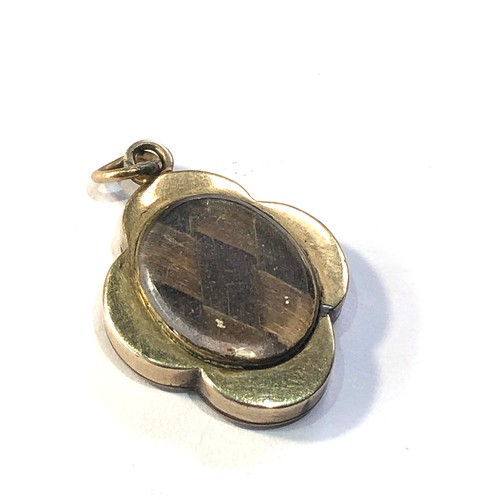 274 - Antique gold enamel mourning hair locket pendant measures approx 2.3cm drop by 17mm wide