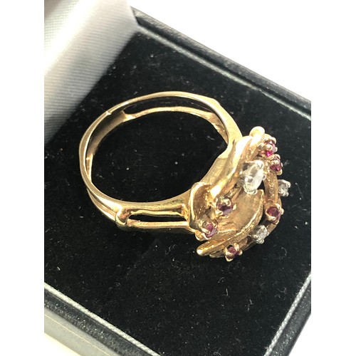 202 - 14ct gold diamond and ruby ring weight 6.3g