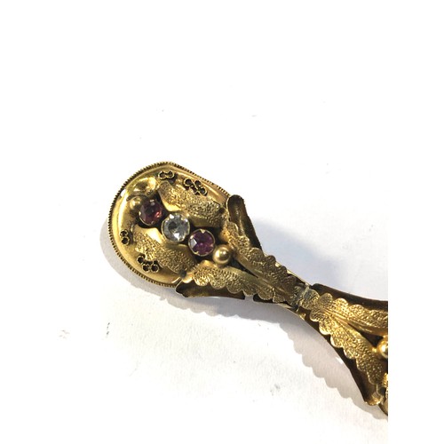 127 - Antique victorian high carat gold earrings that have been made into a brooch measures approx 4.8cm n... 