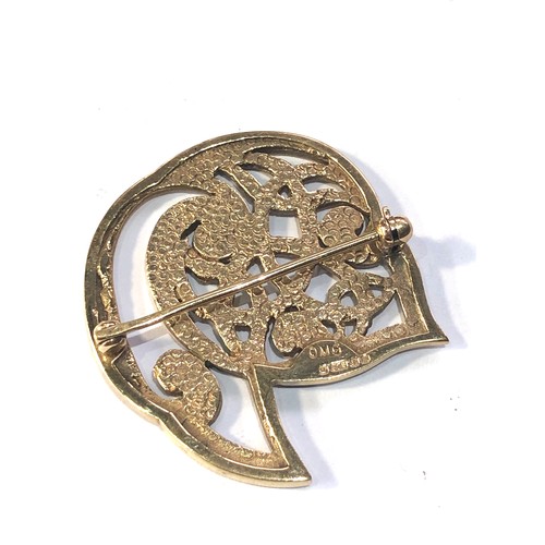 126 - 9ct gold ola Gorie brooch 7.3g