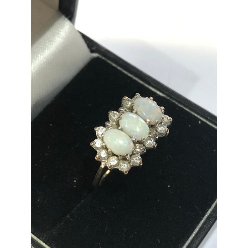 233 - 9ct gold opal trilogy ring weight 2.4g