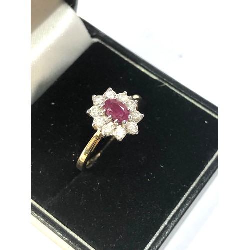 168 - 18ct gold ruby and diamond halo ring weight 3.7g, overall good condition,  marked G750 0.50