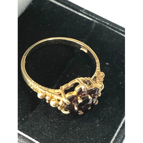 295 - 9ct gold garnet cluster ring weight 2.7g