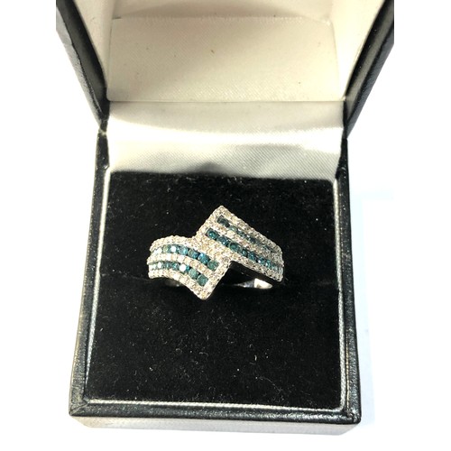 216 - 9ct gold diamond cocktail ring with blue/green stones, weight 4.7g