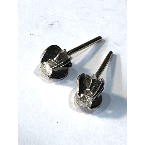 318 - Small 18ct gold diamond stud earrings