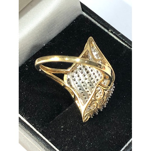 327 - 10ct gold diamond cocktail ring weight 5.6g