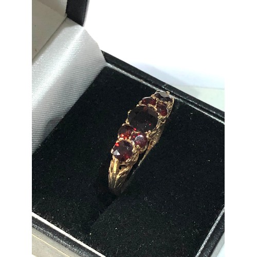 182 - 9ct gold garnet ring weight 2.6g