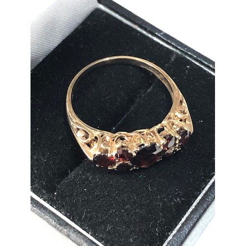 182 - 9ct gold garnet ring weight 2.6g