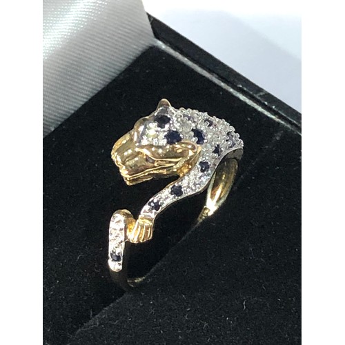 133 - 9ct gold diamond & sapphire jaguar ring 2.9g