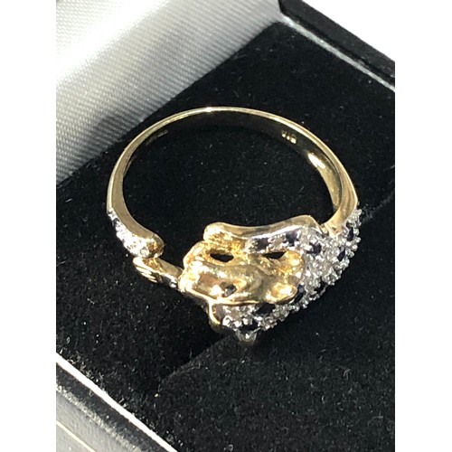 133 - 9ct gold diamond & sapphire jaguar ring 2.9g