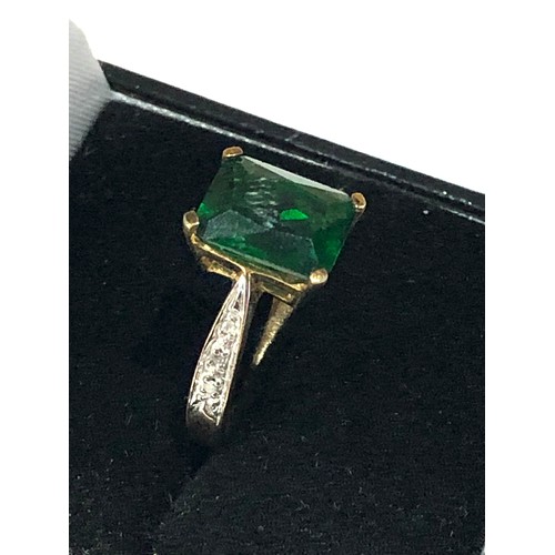 241 - 9ct gold diamond shoulder and gemstone  ring weight 2.2g