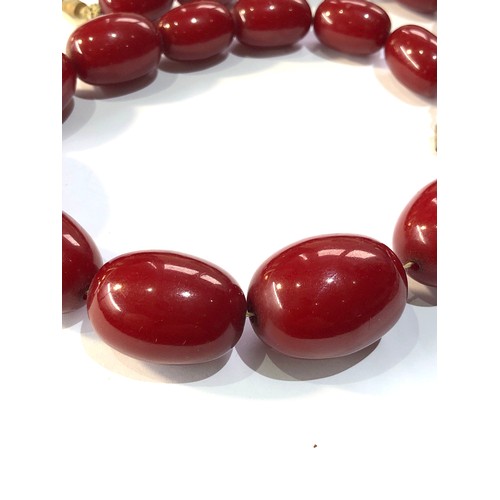 288 - Cherry bakelite amber necklace 86g no internal streaking largest bead measures appox 29mm by 22mm