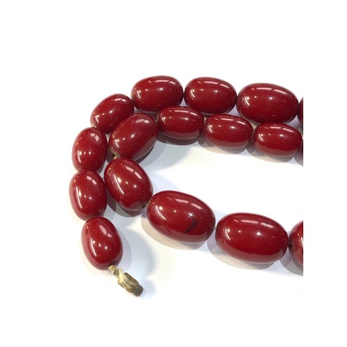 288 - Cherry bakelite amber necklace 86g no internal streaking largest bead measures appox 29mm by 22mm