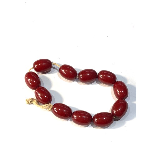 410 - Cherry amber / bakelite bracelet 18g no internal swirls