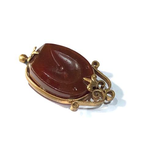 414 - Carved carnelian fob / pendant gold plated solder marks