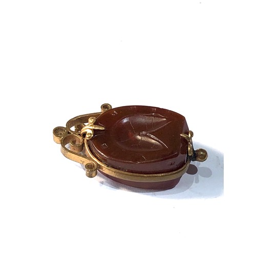 414 - Carved carnelian fob / pendant gold plated solder marks