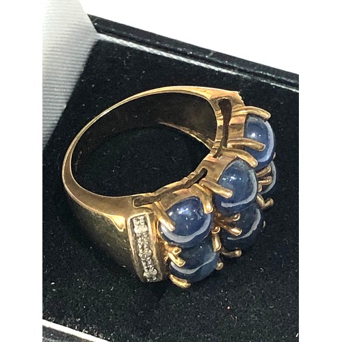 319 - 9ct gold sapphire cocktail ring 9.5g