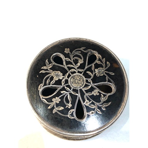 54 - Silver and tortoiseshell lidded box measures approx 4.2cm dis height 2.1cm