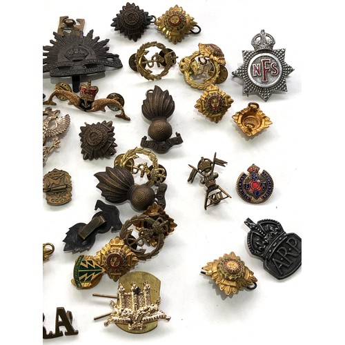 446 - Collection of military and fire service  badges