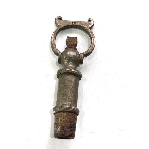 508 - Rare antique whistle and gun cartridge remover