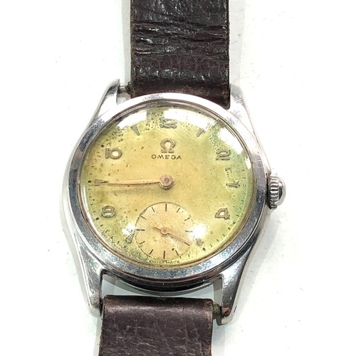 433 - Vintage omega gents wristwatch watch will tick but no warranty given