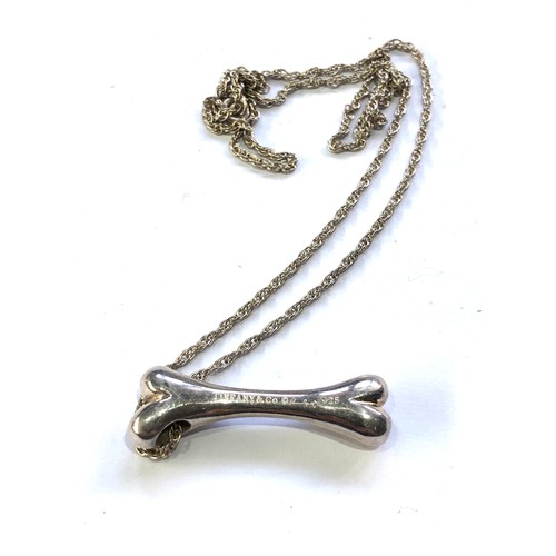 377 - Tiffany & Co silver dog bone pendant and chain