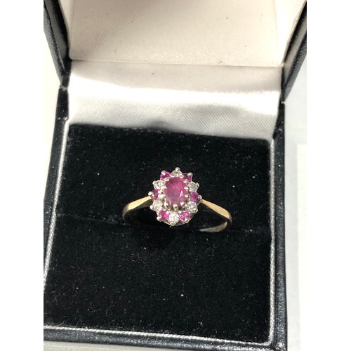 73 - 9ct gold diamond and ruby ring size o-p weight 2g