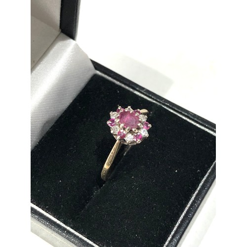 73 - 9ct gold diamond and ruby ring size o-p weight 2g