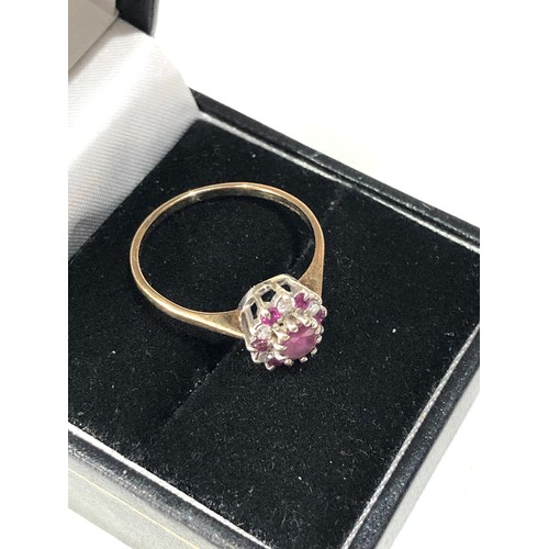 73 - 9ct gold diamond and ruby ring size o-p weight 2g