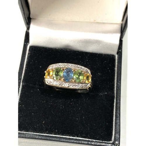 83 - 9ct gold diamond and gem set ring size n weight 4.3g