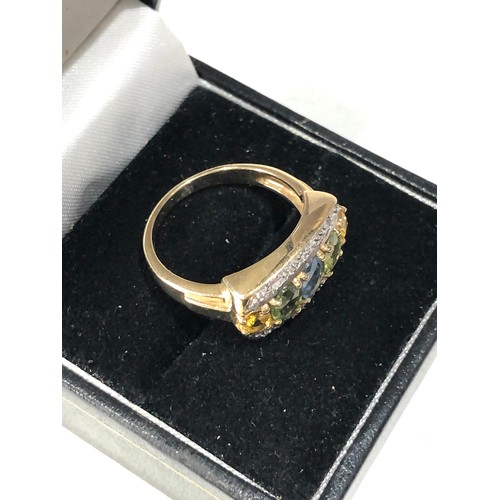 83 - 9ct gold diamond and gem set ring size n weight 4.3g