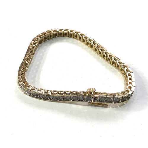 300a - 9ct gold diamond bracelet missing a diamond weight 8g