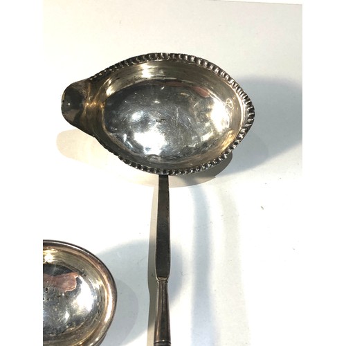 10 - 2 antique silver and horn handle toddy ladles largest measures approx 36cm long