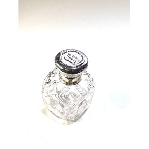 15 - Antique London silver and  glass scent bottle complete with stopper measures approx height 10cm embo... 