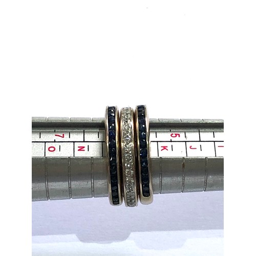 93 - Fine 18ct 3 section gold diamond and sapphire ring made up of 3 seperate rings 2 outer have a band o... 