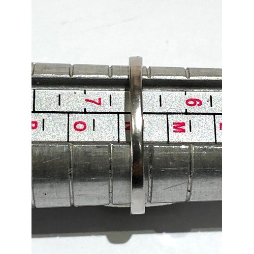 95 - Fine Diamond and Emerald  ring central emerald 0.85ct  with a halo of diamonds around hallmarked pla... 