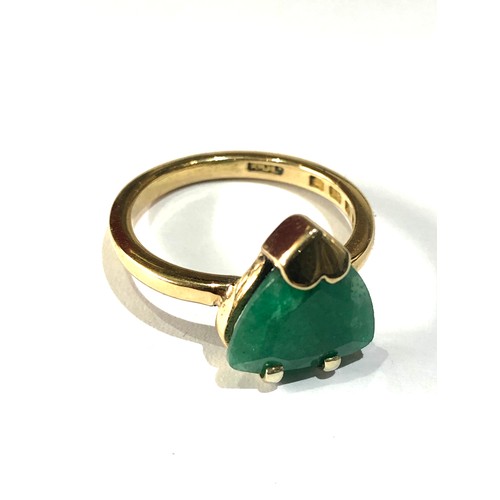 103 - Fine 18ct gold emerald ring large central emerald measures approx 12mm by 11mm weight of ring 4.1g