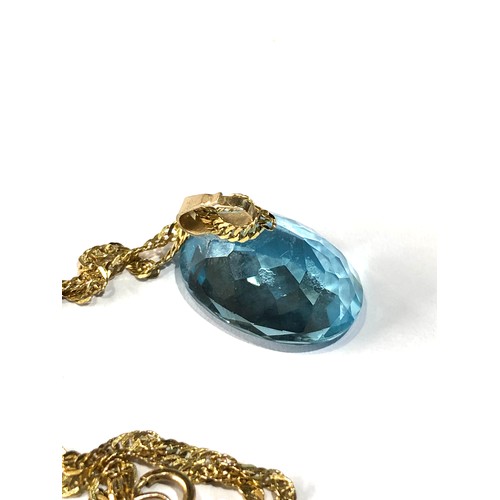 102 - Large Topaz set on 9ct gold chain  topaz measures aprox 16mm by 12mm weight of chain 1.7g